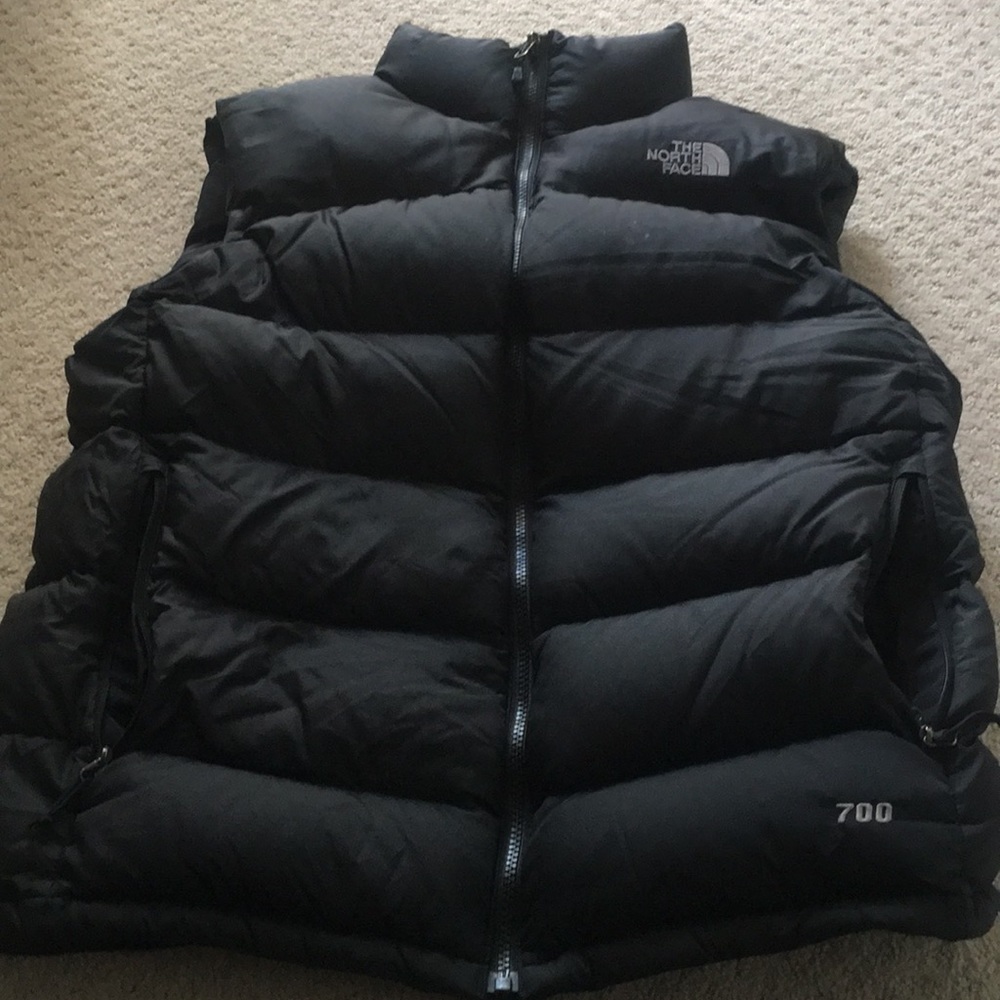 Men's north face puffy vest.